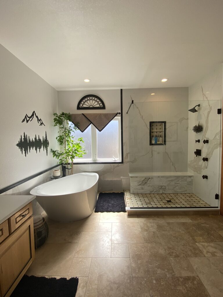 Custom tiled shower with body jets and modern fixtures by Eckert Renovations