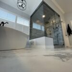 Luxury steam shower with freestanding tub and custom tile work in Broomfield Colorado