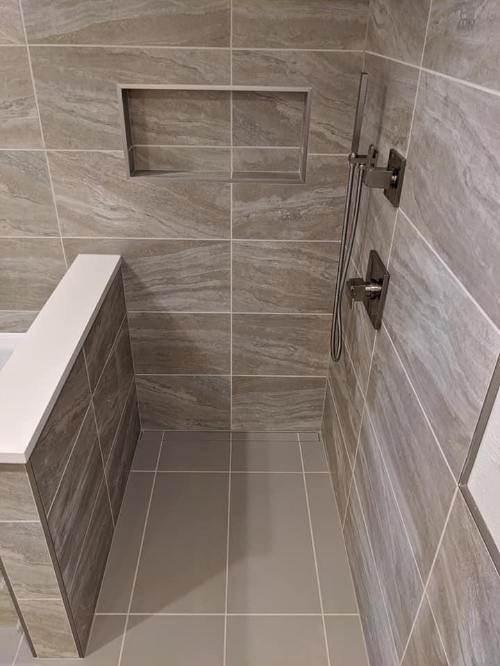 Custom bathroom remodel with walk-in tile shower in Brighton, CO by Eckert Renovations